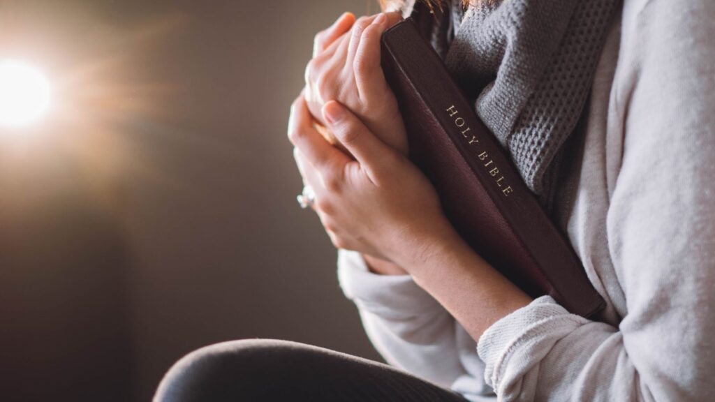 Woman holding Bible