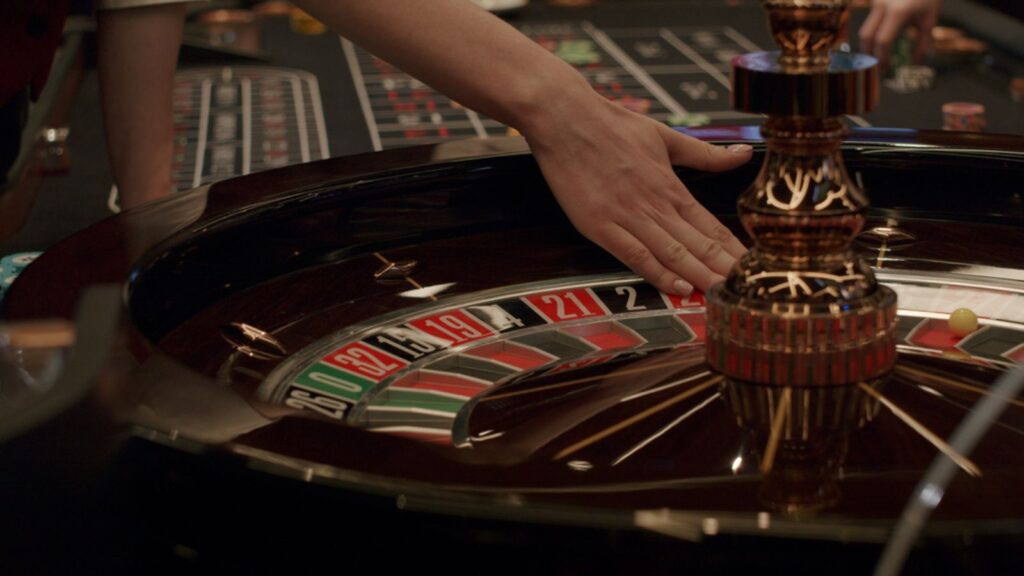 Roulette players place their bets