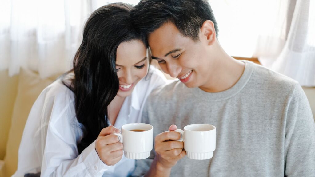 happy couple taking coffee