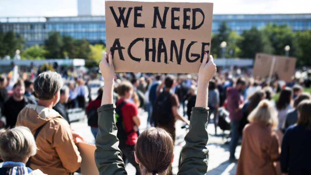 boycott,protest, people with placards and posters on global strike for climate change.