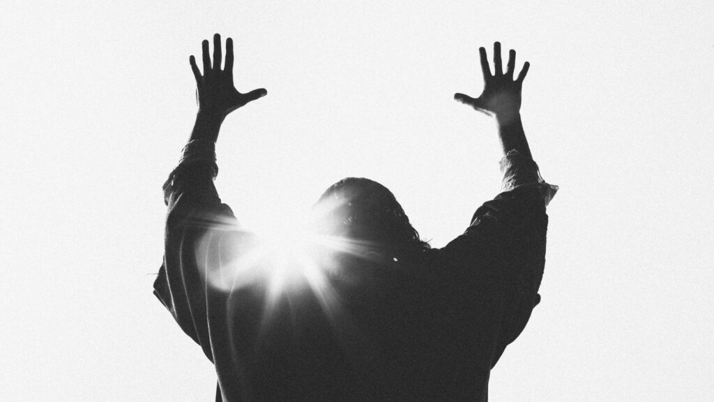 jesus with raised hands to god