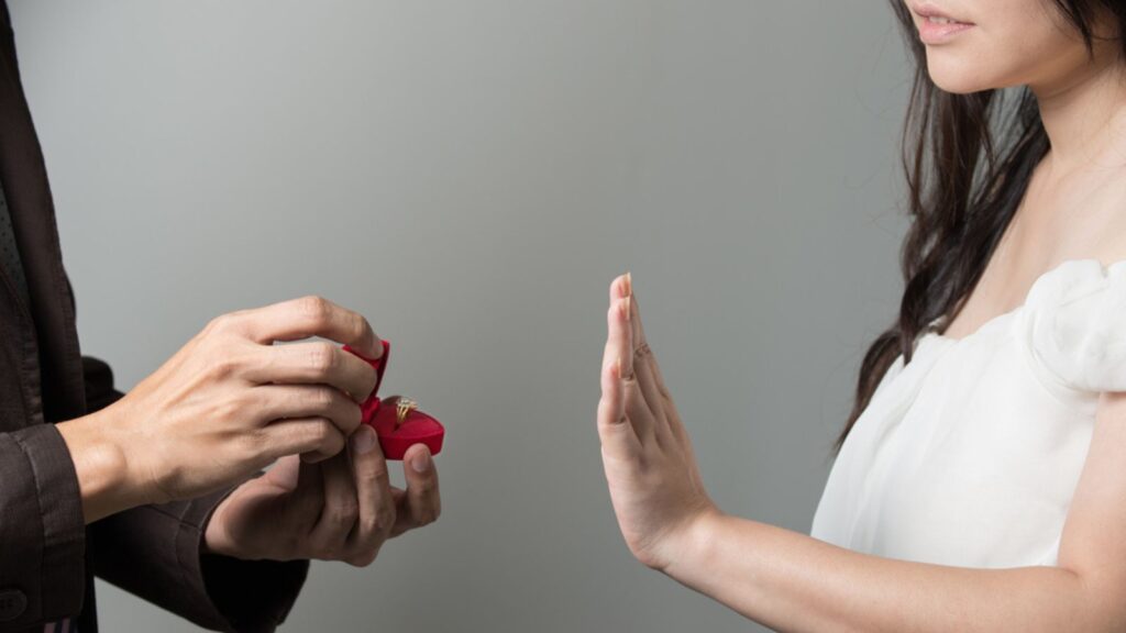 man made a proposal of marriage. But the woman did not accept.