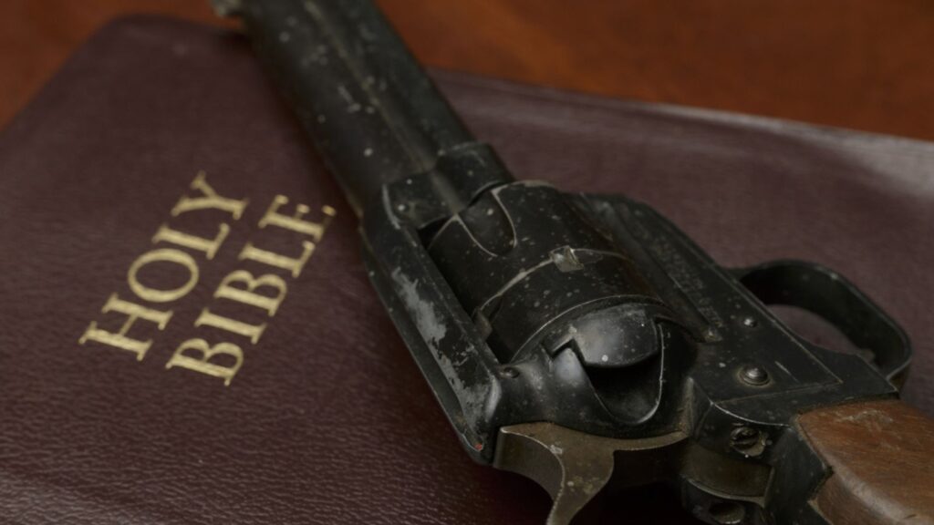 old revolver on bible,gun