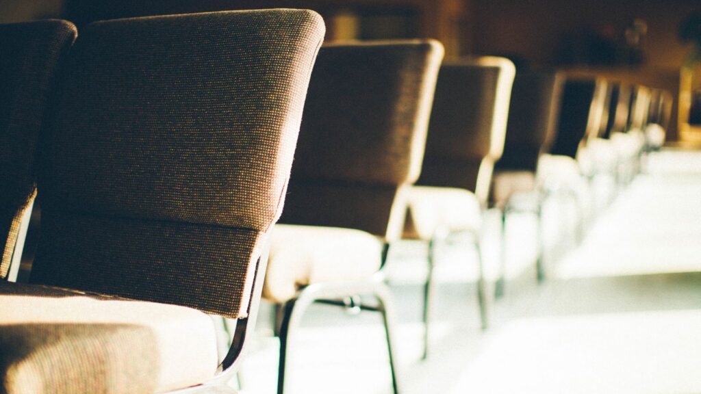 rows of empty church chairs